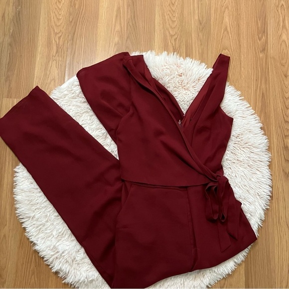 Lulu’s Like It Like That Wine Red Sleeveless Surplice Jumpsuit - Picture 3 of 13